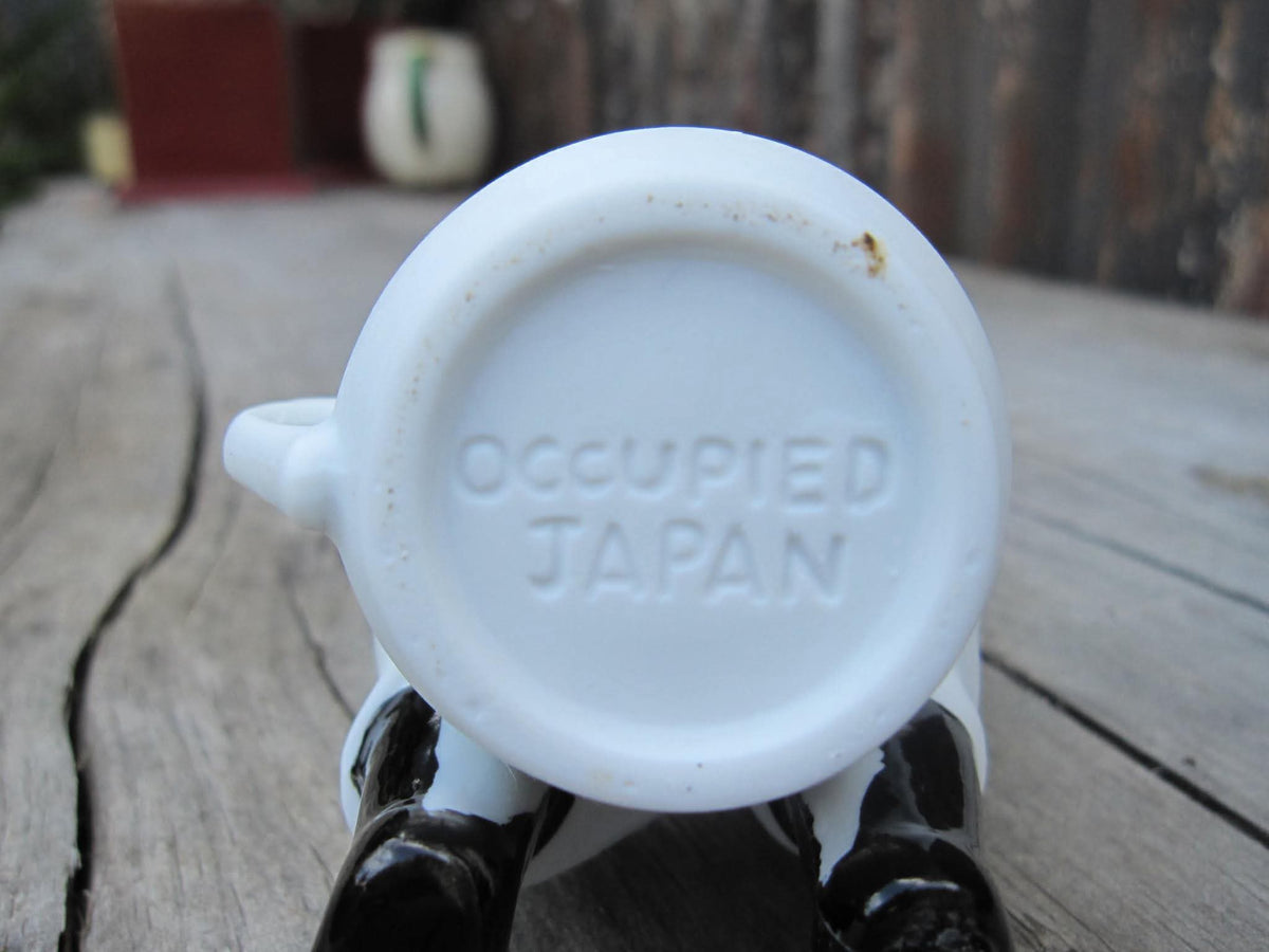 Occupied Japan | Black Americana Caricature Figure | Seated Figure with Watermelon | Porcelain | 1945–1952