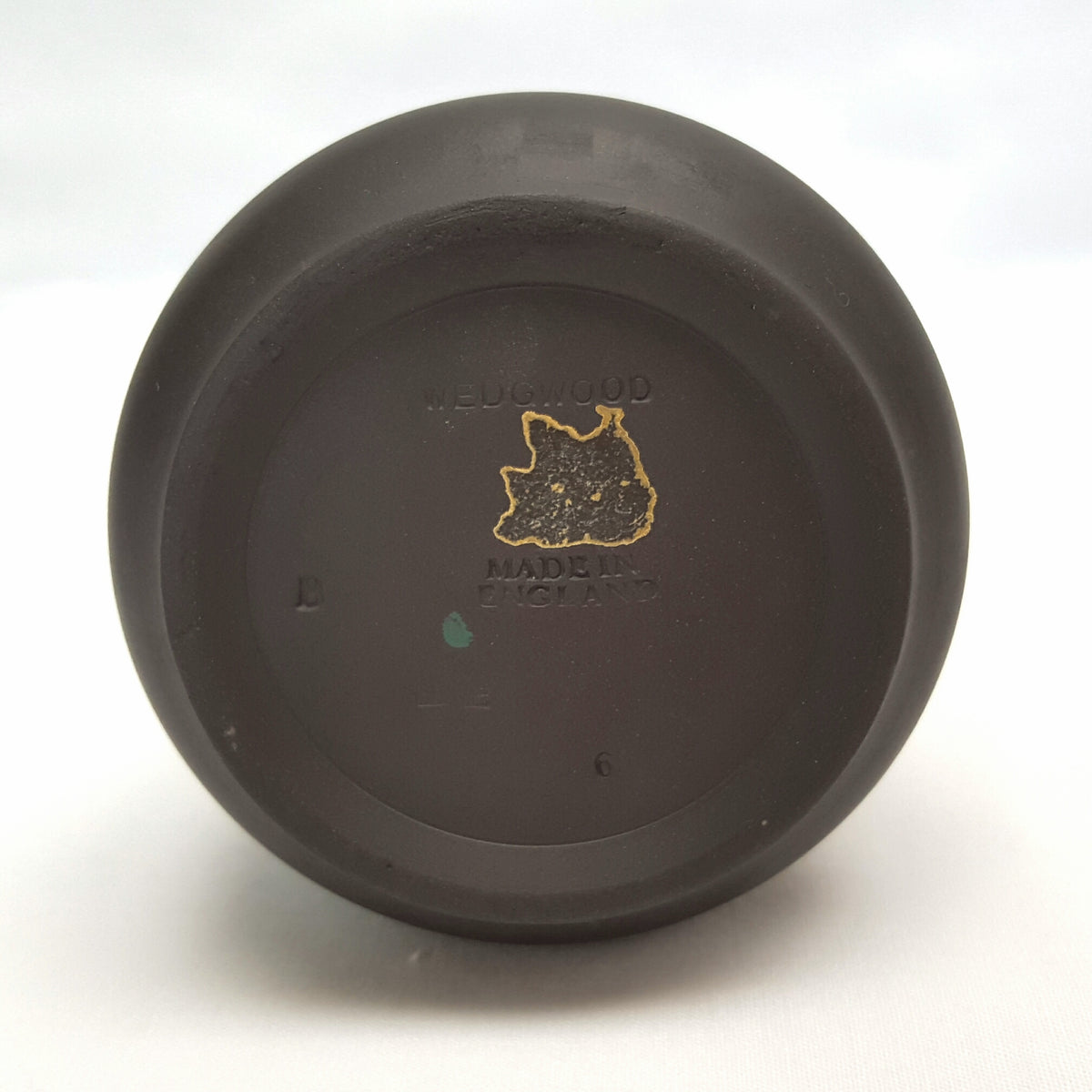 Vintage Wedgwood Black Basalt Jasperware bud vase with classical relief decoration