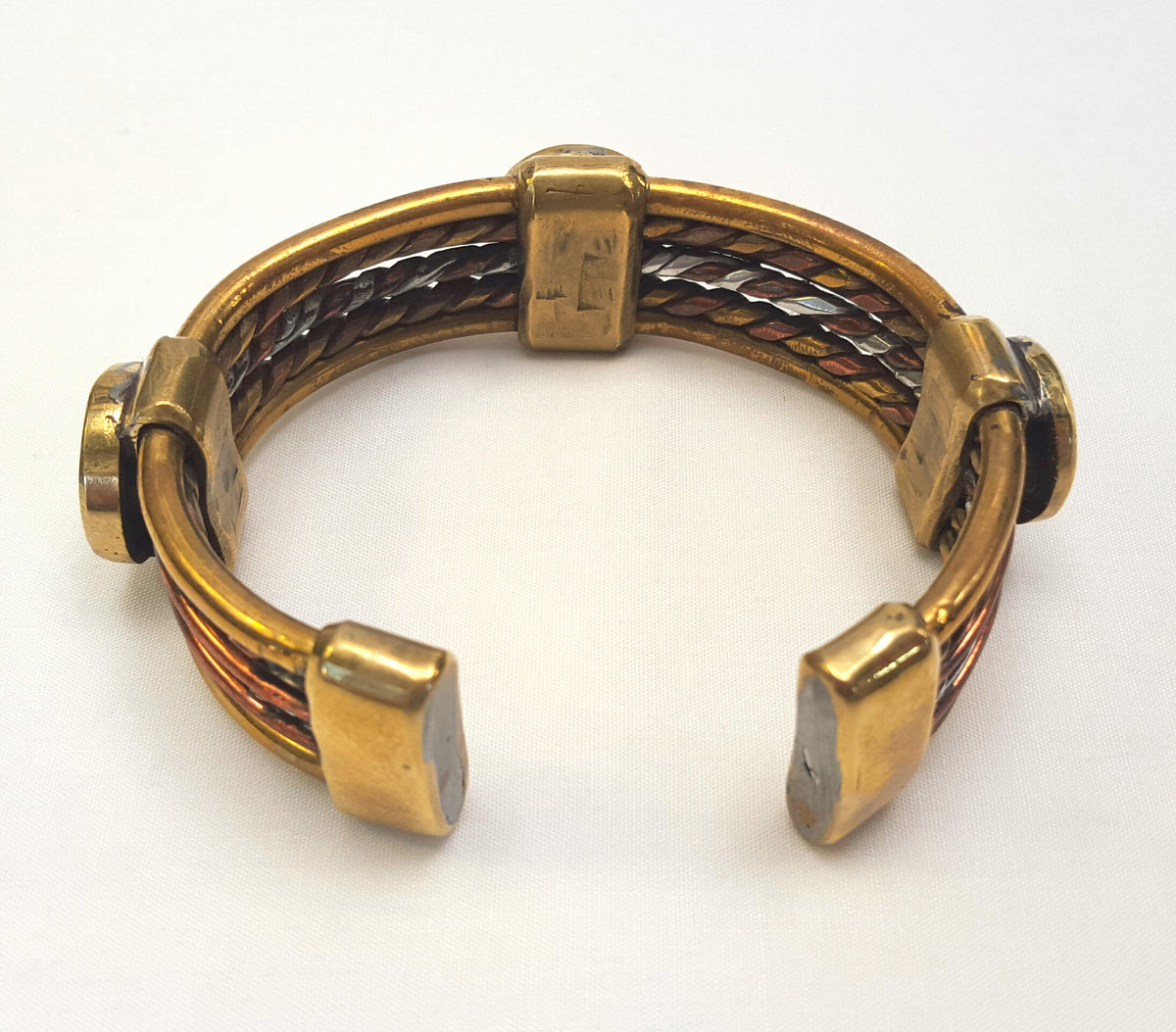 Handcrafted solid copper and brass men’s statement bangle set with three striking natural Malachite cabochons