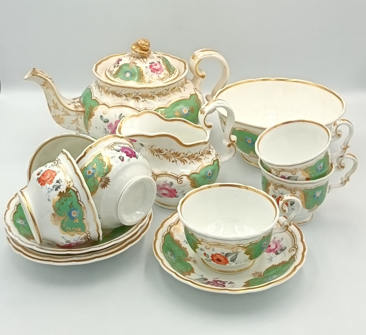 English Porcelain | Part Tea Service | Green Ground with Gilt Acanthus and Hand-Painted Flower Reserves | Pattern 239 | c.1820–1840 | 13 Pieces
