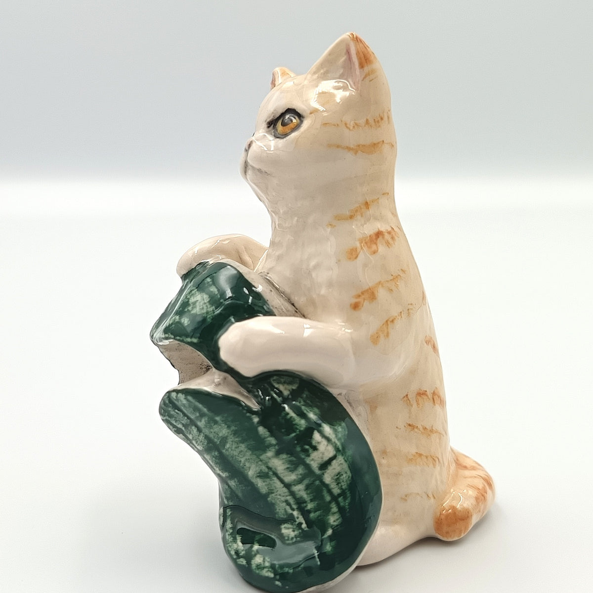 Royal Doulton | New Toy | DA232 | Striped Kitten with Green Slipper | Gloss | 1995–1999