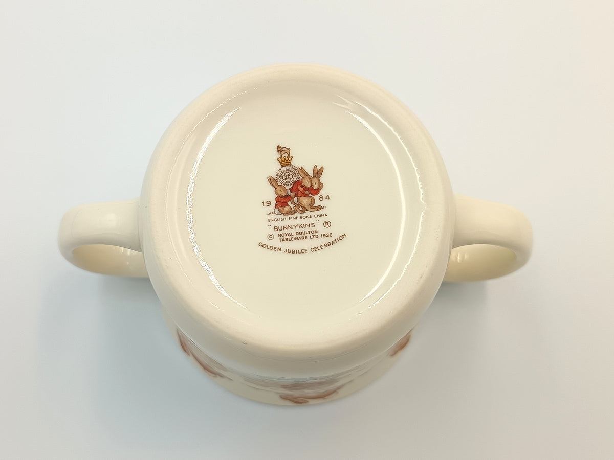 Royal Doulton | Bunnykins | Two-Handled Child's Mug | Fine Bone China | England, 1984 — Golden Jubilee Celebration