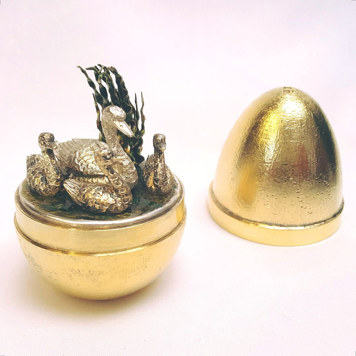 Stuart Devlin | Silver-Gilt 'Surprise' Egg | Mother Swan & Three Cygnets with Green Enamel Foliage | Limited Edition No. 70 | London Hallmarked 1984 | Royal Warrant Presentation Case | Exceptional Collector's Piece