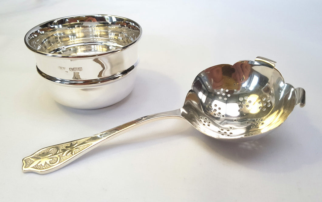 Hallmarked sterling silver  tea strainer & bowl