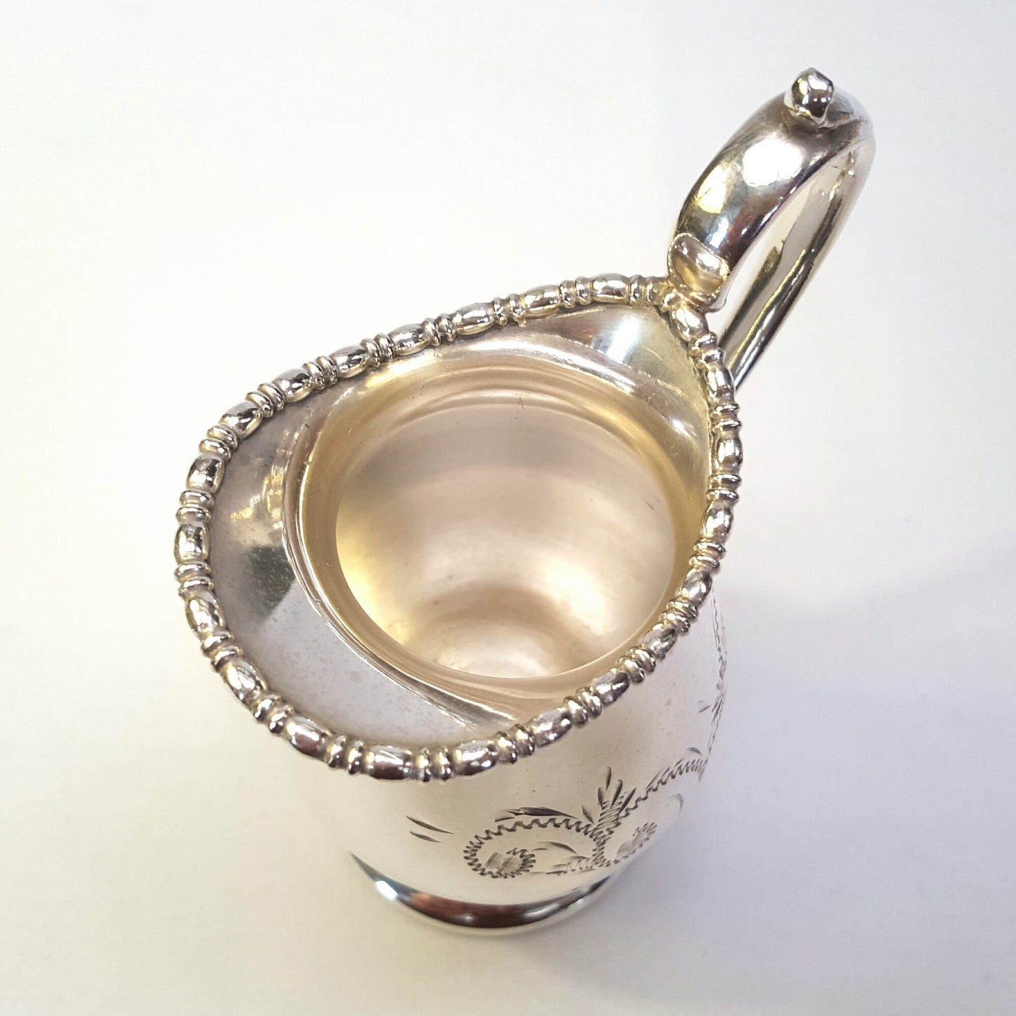 Elegant Antique Viners Silver-Plated Milk Jug with Scroll Engraving