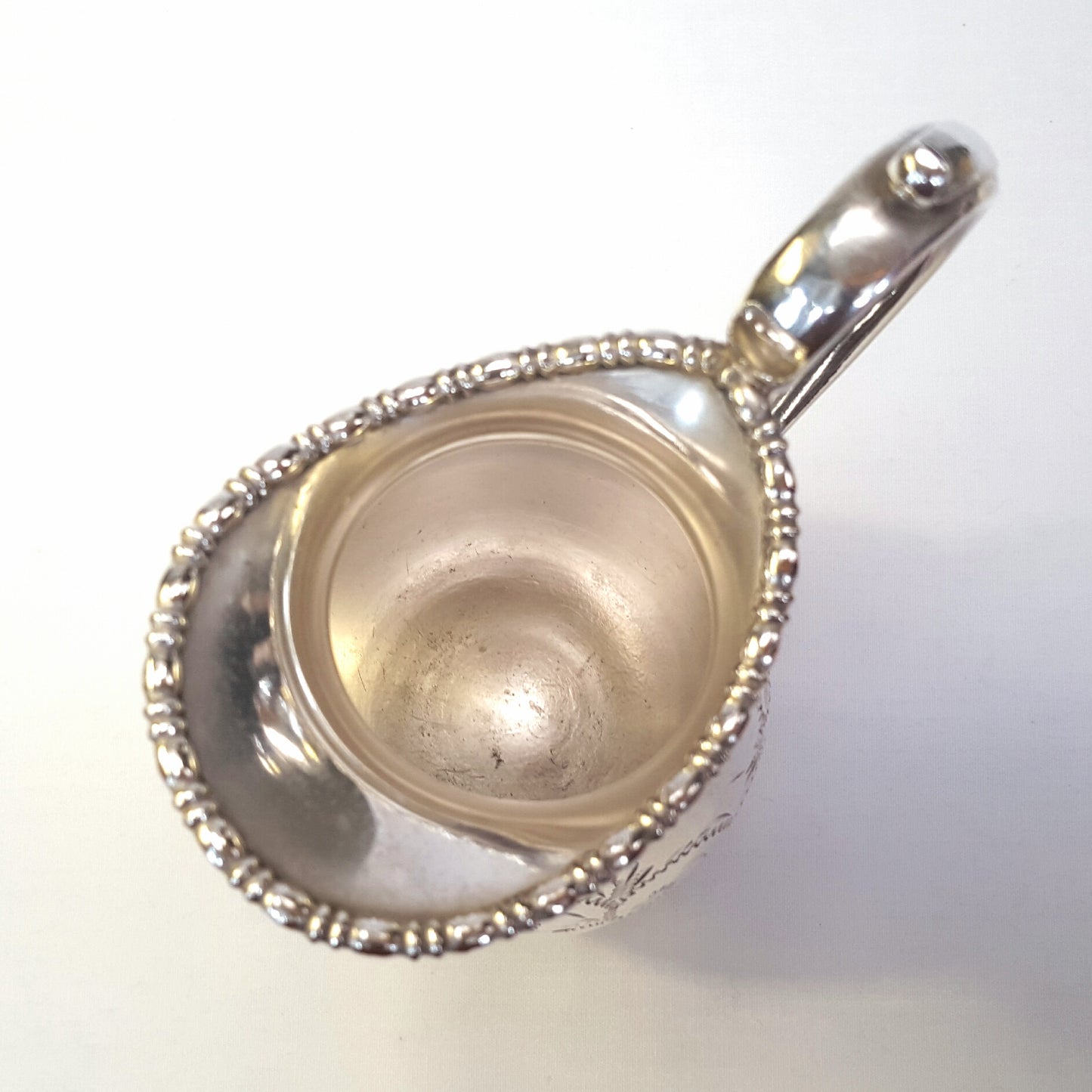 Elegant Antique Viners Silver-Plated Milk Jug with Scroll Engraving