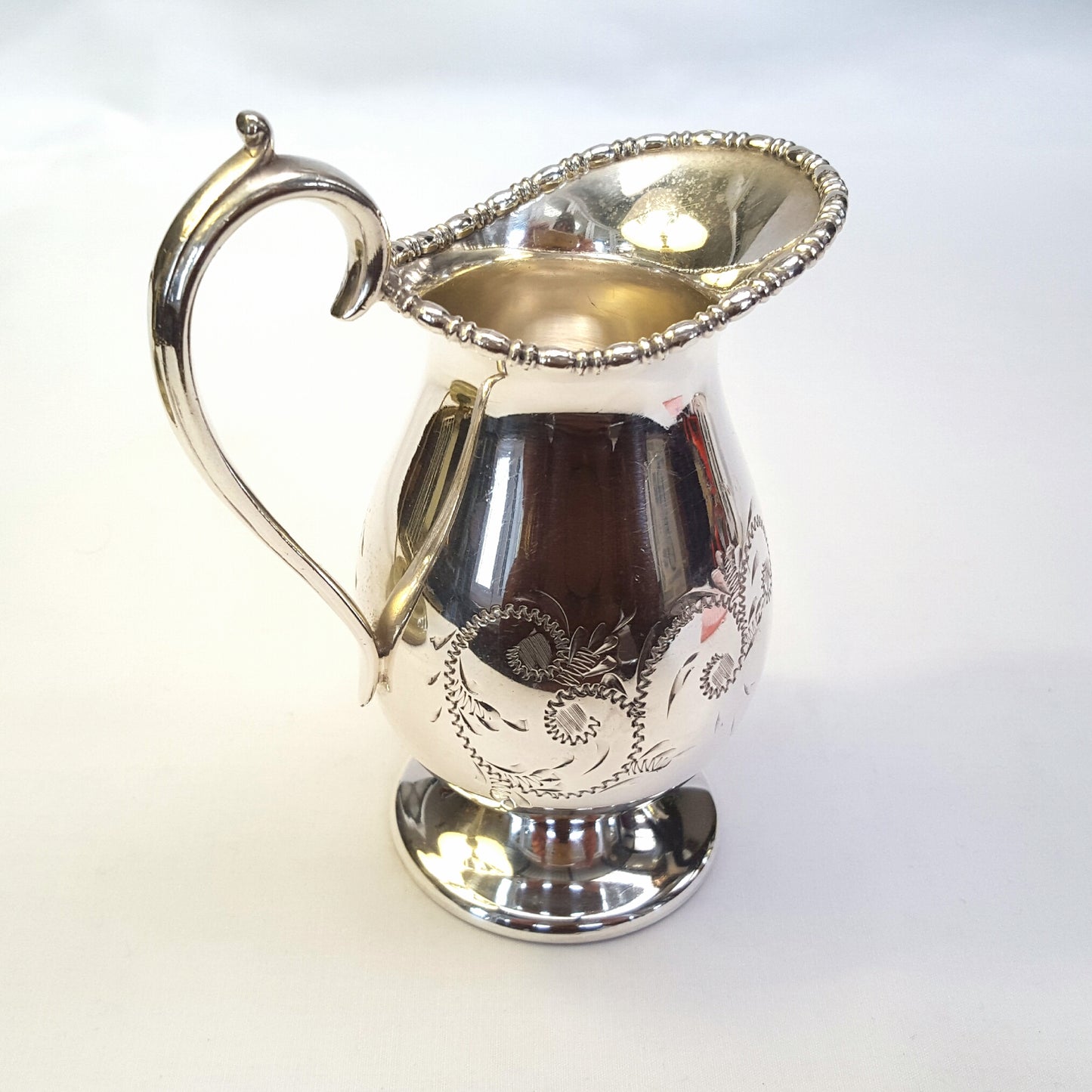 Elegant Antique Viners Silver-Plated Milk Jug with Scroll Engraving
