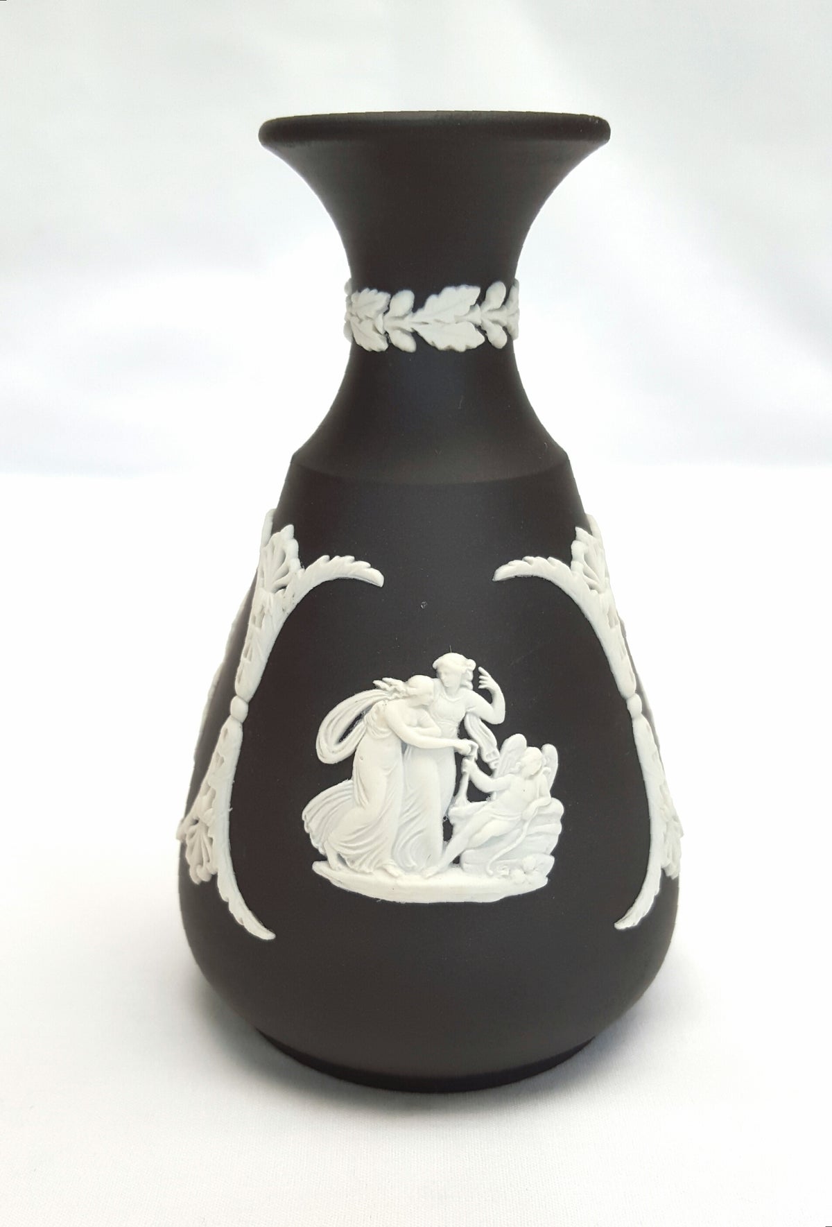 Vintage Wedgwood Black Basalt Jasperware bud vase with classical relief decoration