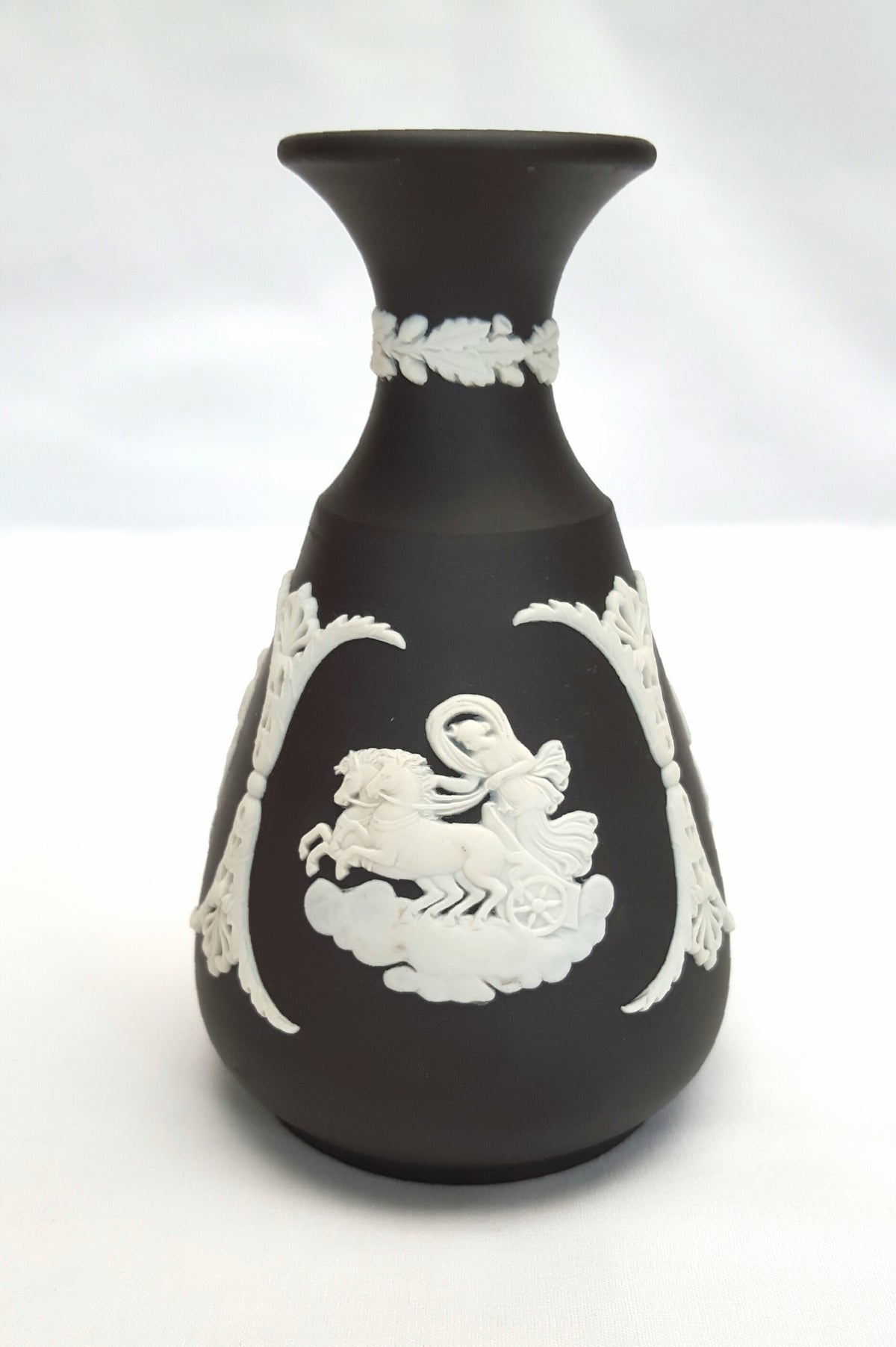 Vintage Wedgwood Black Basalt Jasperware bud vase with classical relief decoration
