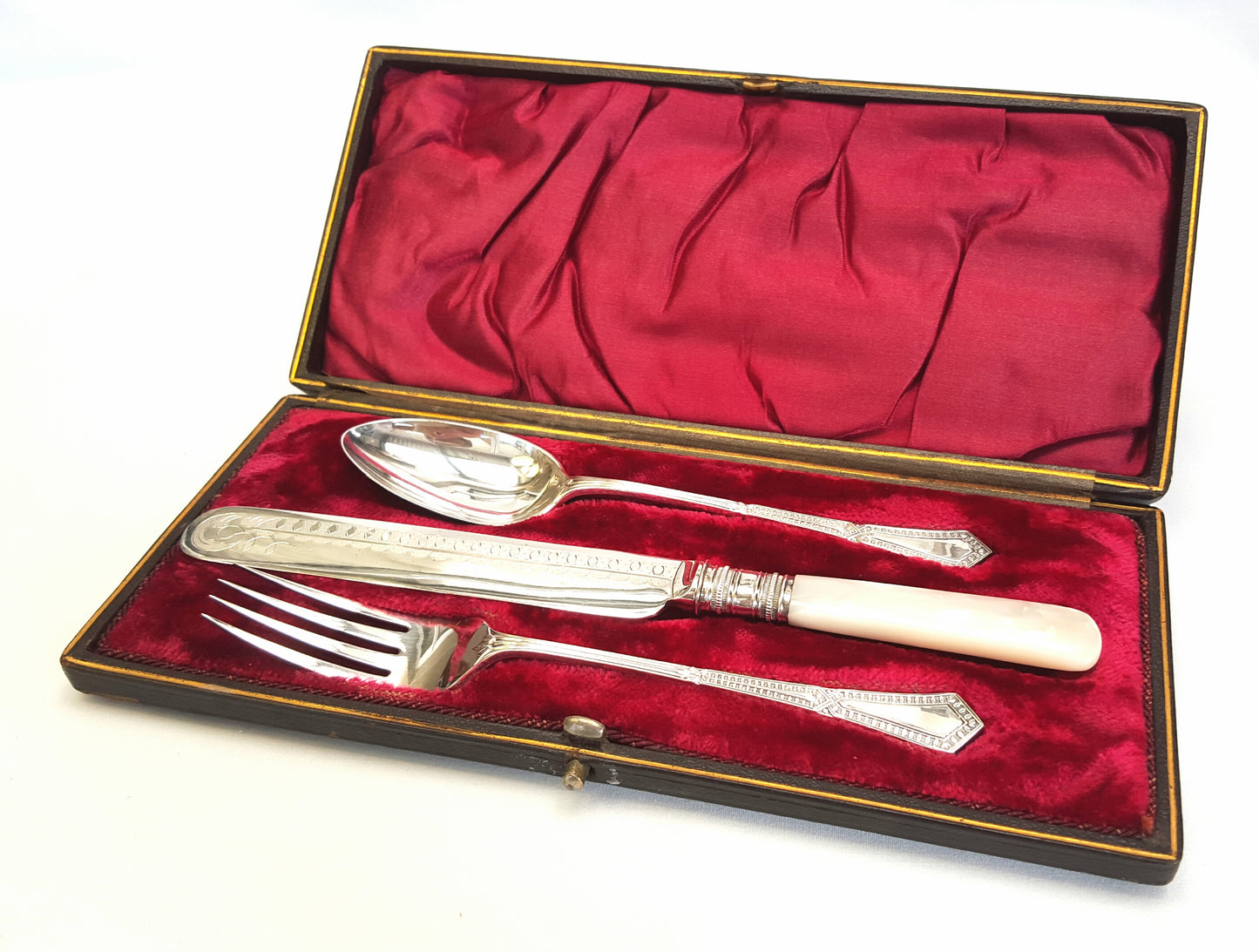 Rare Victorian flatware set for one with mother-of-pearl handles in original presentation case.