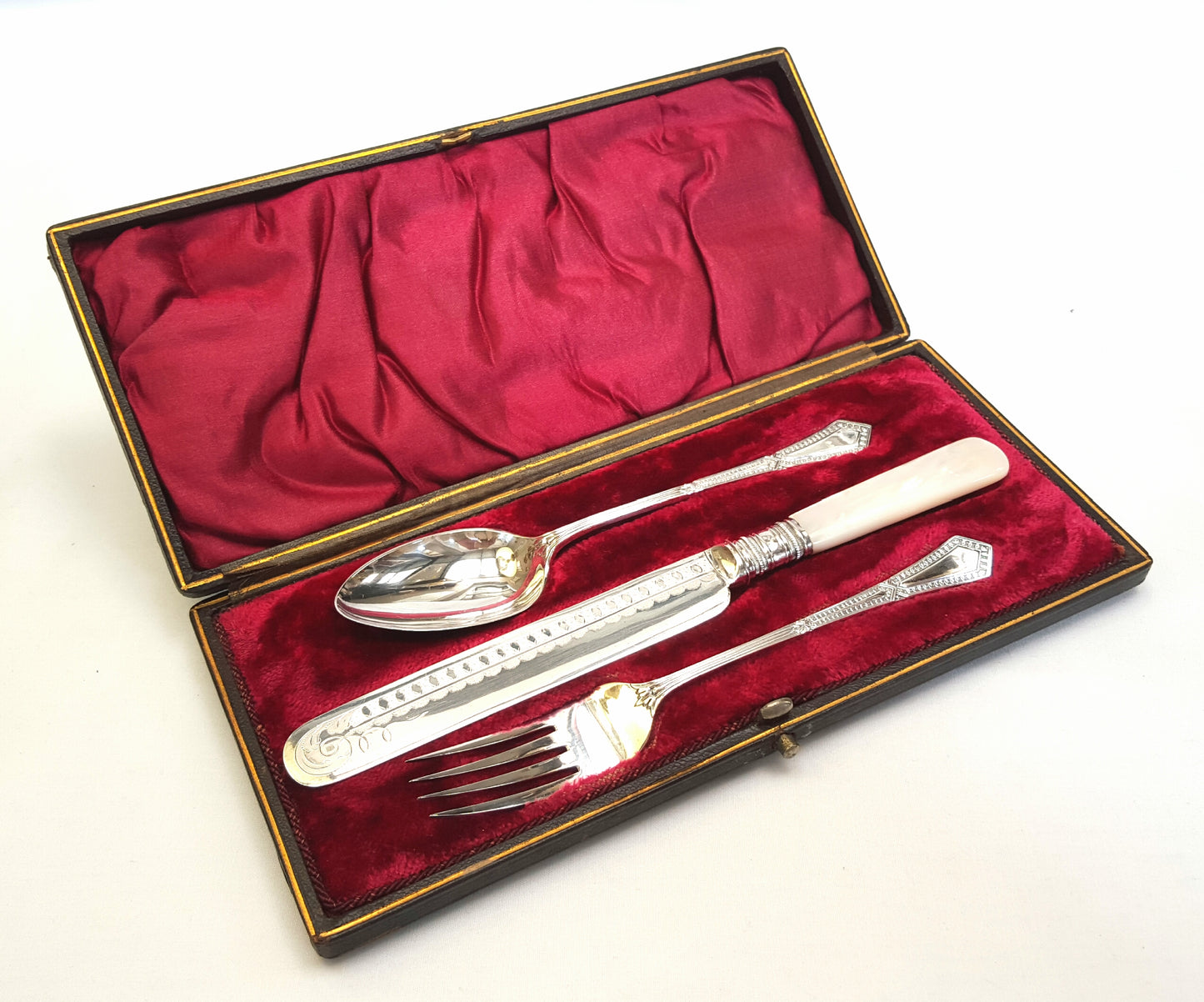 Rare Victorian flatware set for one with mother-of-pearl handles in original presentation case.