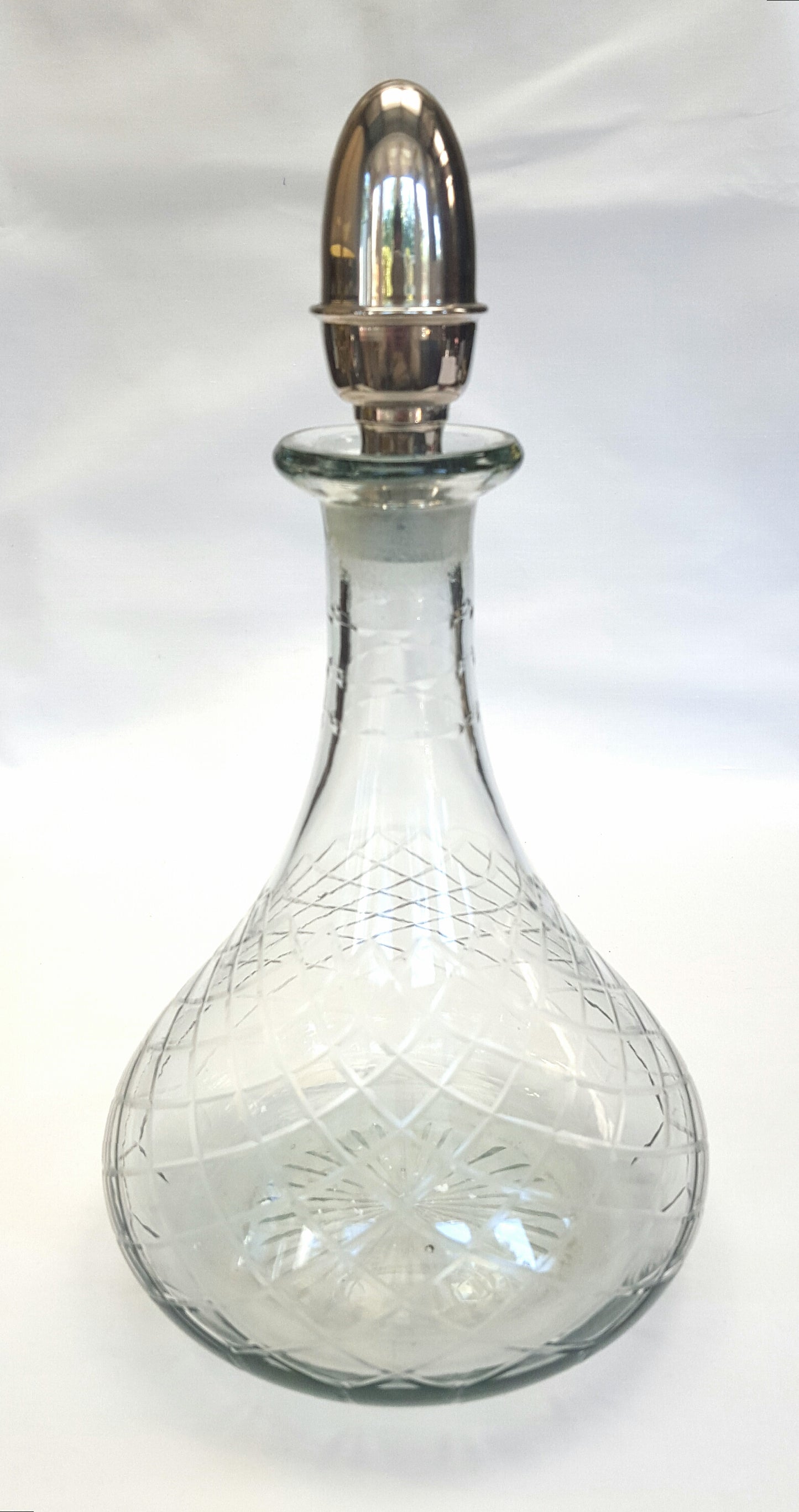 Vintage Hand-Cut Glass Decanter with Intricate Pattern