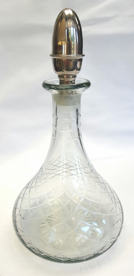 Vintage Hand-Cut Glass Decanter with Intricate Pattern